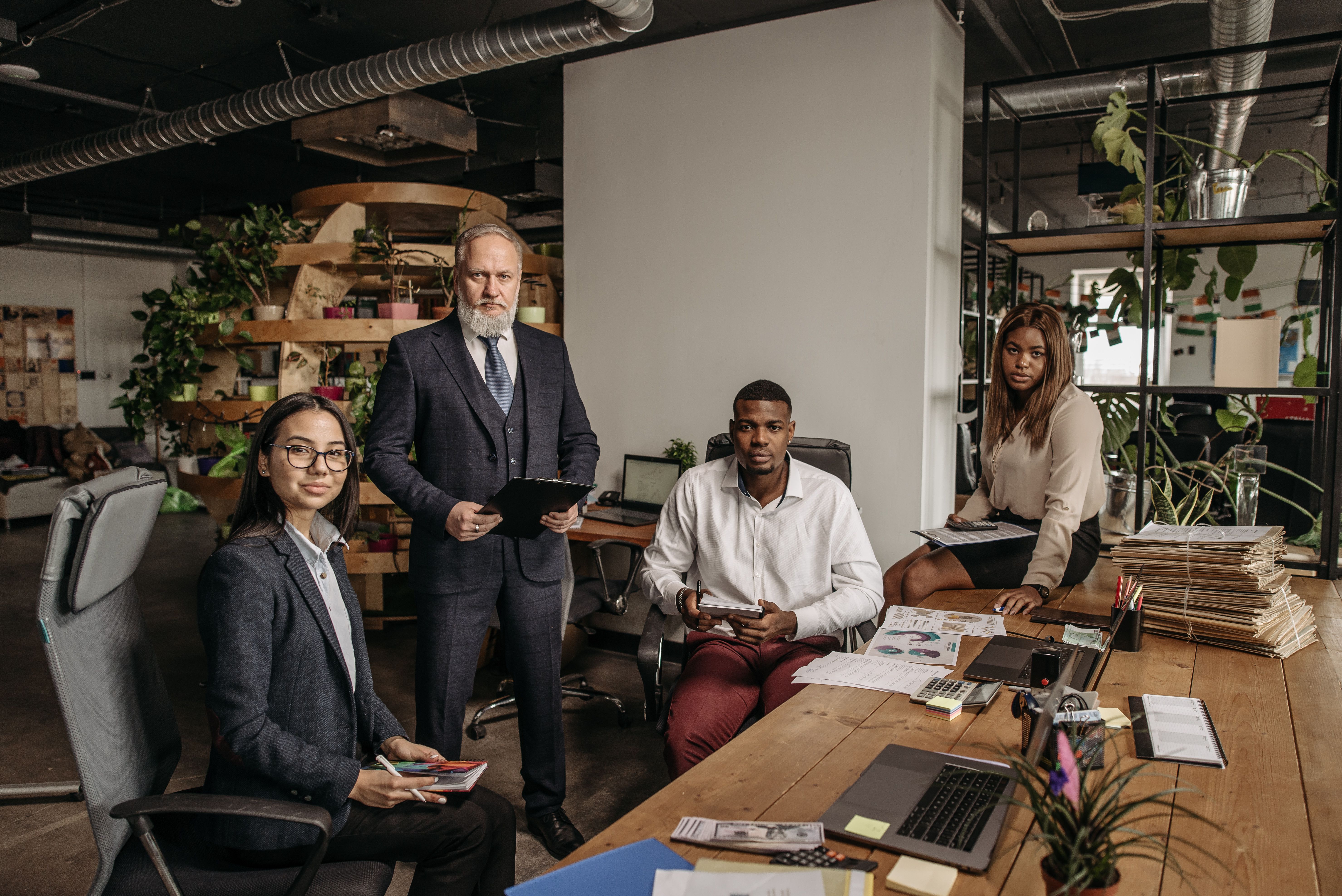 A team reviewing documents together in an office
