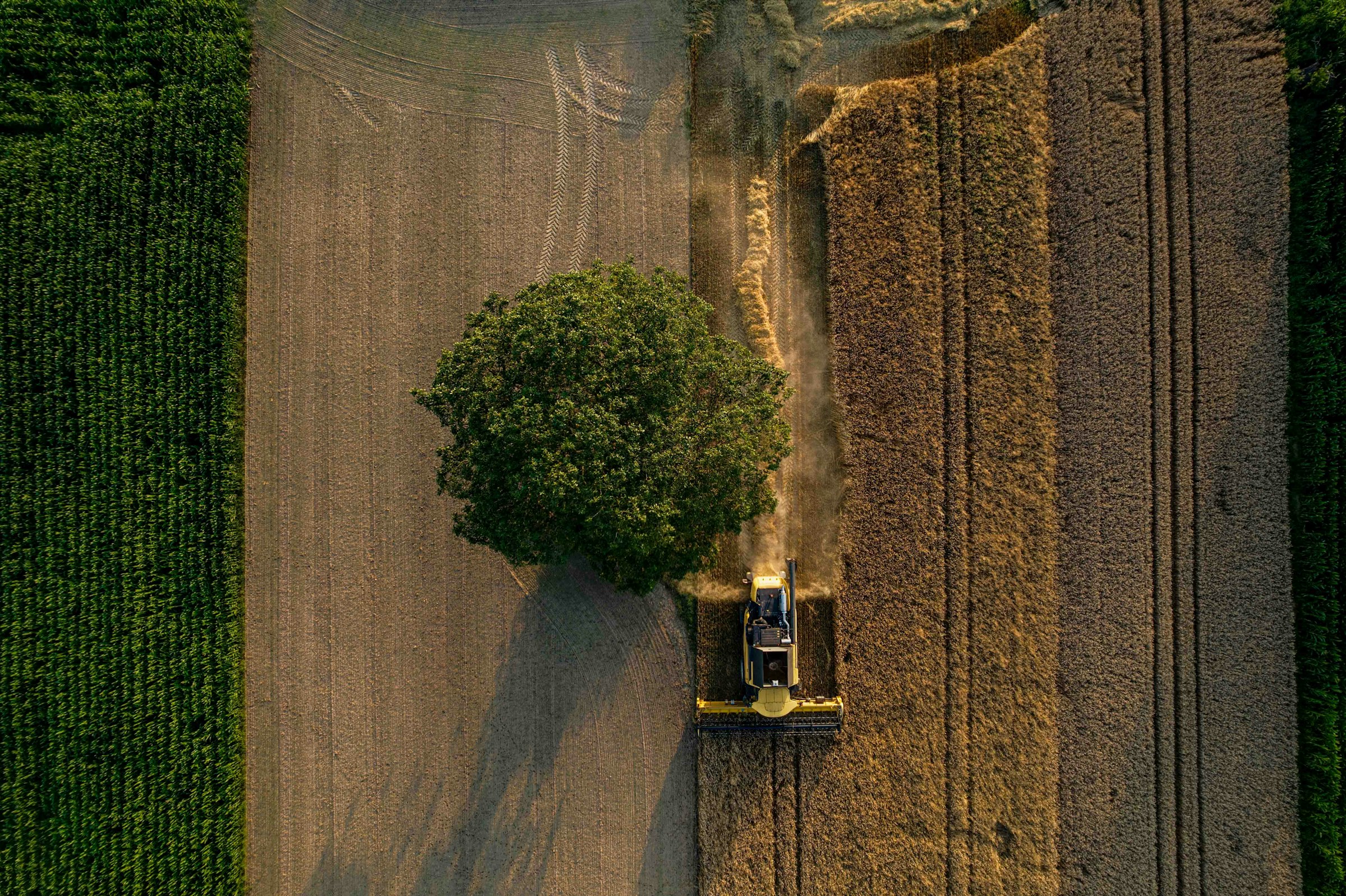 Aerial view of a harvester working a field